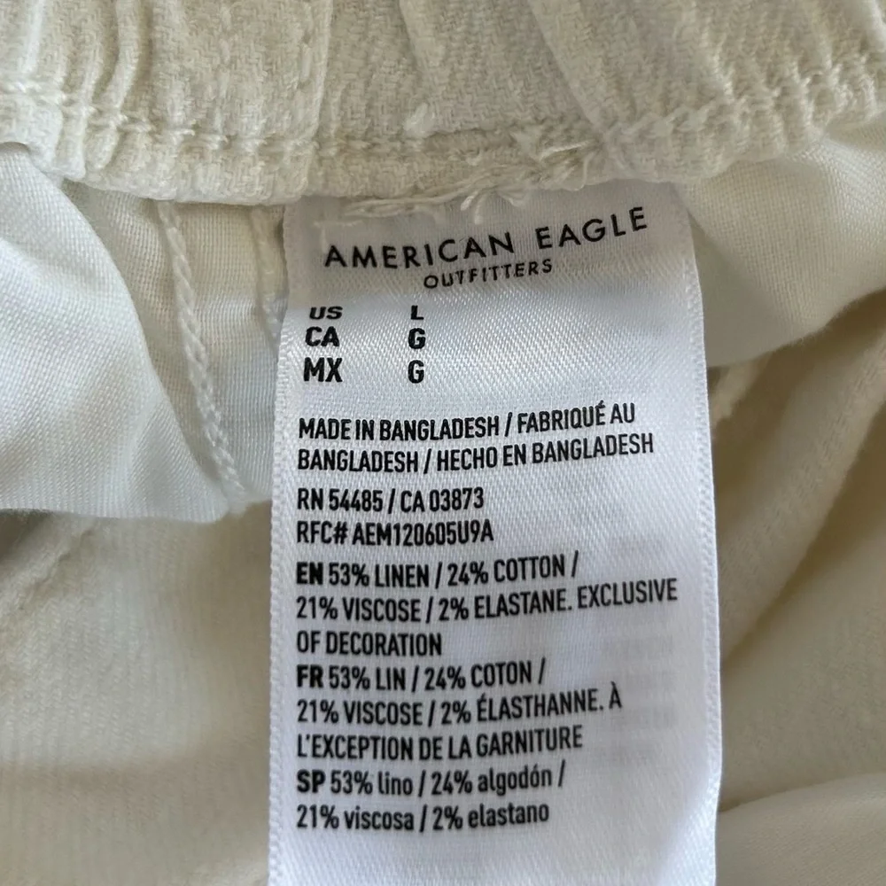 American Eagle Outfitters Ruffle Hem Cream Shorts - Picture 8 of 8